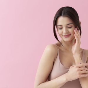 medium-shot-smiley-woman-posing-with-copy-space